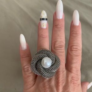 Silvertone flower cocktail ring